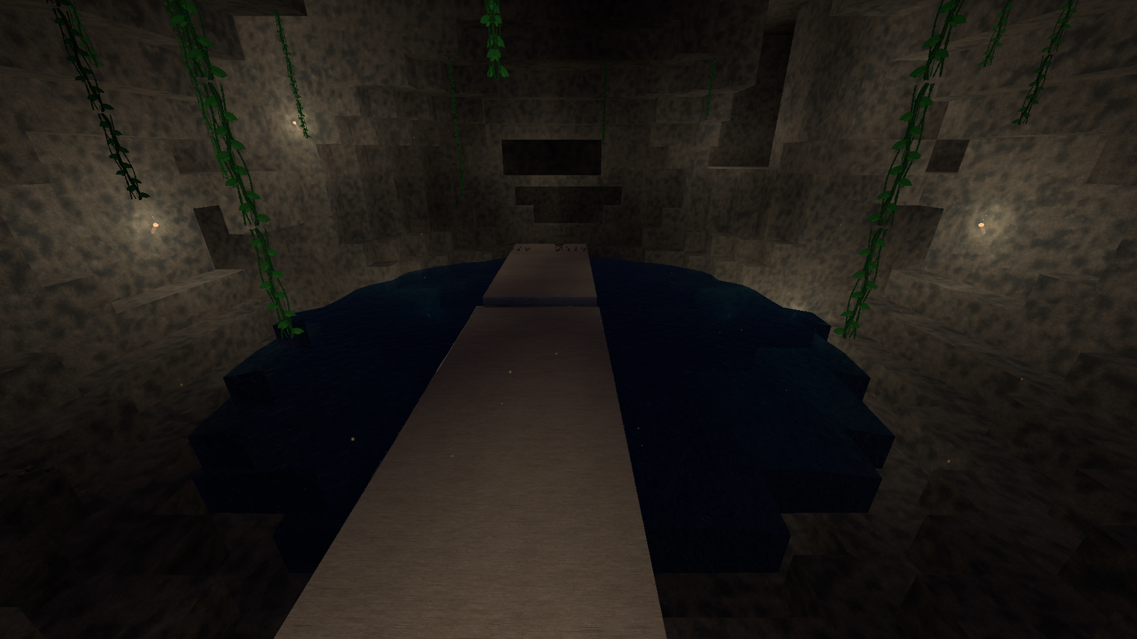 A cavern bulge opened along the descent, with the lake and the bridge